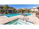 Inviting community pool and spa area with well-maintained landscaping and relaxing lounge chairs at 20660 N 40Th St # 1112, Phoenix, AZ 85050
