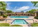 Resort-style swimming pool and hot tub with cabanas and mature trees at 20660 N 40Th St # 1112, Phoenix, AZ 85050