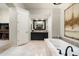 Bright bathroom features a soaking tub, double vanity, and tile flooring at 21235 N 80Th Way, Scottsdale, AZ 85255