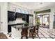 Spacious kitchen with granite counters, stainless appliances, and dark wood cabinetry at 21235 N 80Th Way, Scottsdale, AZ 85255