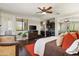 Living room with comfortable seating, wood floors, and a minibar area at 21235 N 80Th Way, Scottsdale, AZ 85255