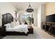 Bright and airy main bedroom with neutral tones, detailed furniture and large windows at 21235 N 80Th Way, Scottsdale, AZ 85255