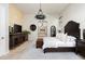 Spacious main bedroom with custom furnishings and adjoining spa tub at 21235 N 80Th Way, Scottsdale, AZ 85255