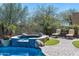 Inviting backyard pool and spa with luxurious lounge seating, set in a tranquil desert landscape at 21235 N 80Th Way, Scottsdale, AZ 85255
