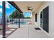 Covered back patio offers an idyllic view of the fenced pool and spa for outdoor relaxation at 2522 N Robin Ln, Mesa, AZ 85213