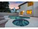 Backyard pool and spa with a view of the home's exterior and neighboring house at 2522 N Robin Ln, Mesa, AZ 85213