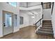 Open foyer area featuring high ceilings, hardwood floors, and a staircase at 2522 N Robin Ln, Mesa, AZ 85213