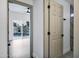 Hallway with view into the pool area and a view of the pool outside at 2522 N Robin Ln, Mesa, AZ 85213