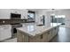 Beautiful kitchen features stainless steel appliances, granite countertops, an island, and modern finishes at 2522 N Robin Ln, Mesa, AZ 85213
