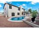 Beautiful backyard features a sparkling pool and spa, complemented by lush landscaping at 2522 N Robin Ln, Mesa, AZ 85213