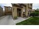 Inviting front entrance showcasing stucco walls, decorative cactus landscaping, and a welcoming front door at 2673 E Remington Pl, Chandler, AZ 85286
