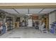 Spacious garage, ready for parking and storage with shelving and room for tools at 2673 E Remington Pl, Chandler, AZ 85286