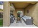 Relaxing covered patio with comfortable seating and stylish outdoor decor at 2673 E Remington Pl, Chandler, AZ 85286