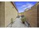 Side yard with a stone paver walkway at 2673 E Remington Pl, Chandler, AZ 85286