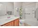 Bright bathroom with a bathtub, shower, and single vanity at 2857 N Mystic Ct, Casa Grande, AZ 85122