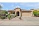 Charming single-story home featuring desert landscaping and a tile roof at 2857 N Mystic Ct, Casa Grande, AZ 85122