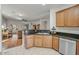Open-concept kitchen featuring stainless steel appliances with views of the living room at 2857 N Mystic Ct, Casa Grande, AZ 85122