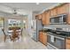 Cozy kitchen with stainless steel appliances and an adjacent breakfast nook at 2857 N Mystic Ct, Casa Grande, AZ 85122