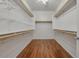 Spacious walk-in closet with hardwood floors and ample shelving at 2857 N Mystic Ct, Casa Grande, AZ 85122