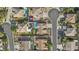 Aerial view shows meticulously landscaped yards, pools, sports courts, and well-maintained homes in the neighborhood at 2894 E Nolan Pl, Chandler, AZ 85249