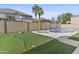 Home backyard features a putting green, beautiful pool, and spa; ideal for relaxation and entertainment at 2894 E Nolan Pl, Chandler, AZ 85249