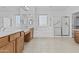 Bathroom featuring double sinks, soaking tub, walk in shower and tile floors at 2894 E Nolan Pl, Chandler, AZ 85249