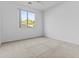 Bright bedroom with carpet, a large window with backyard views, and neutral paint at 2894 E Nolan Pl, Chandler, AZ 85249