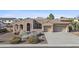 Charming single-story home boasting a spacious three car garage and well maintained desert landscaping at 2894 E Nolan Pl, Chandler, AZ 85249