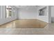 Large living room with hardwood floors and tons of natural light from large windows at 2894 E Nolan Pl, Chandler, AZ 85249