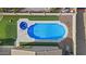 Aerial view of a private backyard with a sparkling pool and spa at 2894 E Nolan Pl, Chandler, AZ 85249