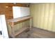 Interior of shed with a workbench, plywood, and pegboard at 300 S Val Vista Dr # 167, Mesa, AZ 85204