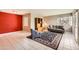 Spacious living area featuring tile flooring, a stylish rug, and ample natural light from multiple windows at 302 E Orange Dr, Phoenix, AZ 85012