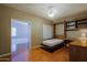 Spare room with built in desk and cabinet with a murphy bed at 3147 N Couples Dr, Goodyear, AZ 85395