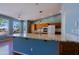 Modern kitchen with granite countertops, stainless steel appliances, and eat in bar area at 3147 N Couples Dr, Goodyear, AZ 85395