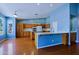Spacious eat in kitchen with lots of cabinet space and blue walls at 3147 N Couples Dr, Goodyear, AZ 85395