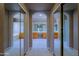 En-suite bathroom with dual mirrored closets and vanity sinks at 3147 N Couples Dr, Goodyear, AZ 85395