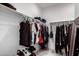 Walk-in closet with organized clothing racks and shelves, providing ample storage space and a streamlined look at 3670 E Sandoval Dr, San Tan Valley, AZ 85140