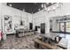 Bright modern kitchen with island seating, stainless steel appliances, and hanging pendant lights at 3670 E Sandoval Dr, San Tan Valley, AZ 85140