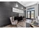 Comfortable lobby area with modern seating, accent wall, and view of the entrance at 3670 E Sandoval Dr, San Tan Valley, AZ 85140