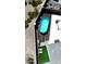 An aerial view highlights a pool, recreational area with cornhole boards, and neat landscaping, enclosed for privacy at 3907 S 75Th Dr, Phoenix, AZ 85043
