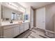 Bathroom featuring double sinks and plenty of vanity counter space at 3907 S 75Th Dr, Phoenix, AZ 85043