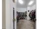 Large walk-in closet with custom shelving and ample space for clothing and storage at 3907 S 75Th Dr, Phoenix, AZ 85043