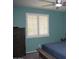 Calm and serene bedroom featuring plantation shutters, ceiling fan, and a neutral carpet at 429 N San Ricardo N Trl, Casa Grande, AZ 85194