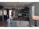 Modern kitchen with stainless steel appliances, dark cabinets, and pendant lighting at 429 N San Ricardo N Trl, Casa Grande, AZ 85194