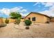 Spacious backyard with low-maintenance landscaping, ideal for relaxation and outdoor activities at 43142 N Outer Bank Dr, Anthem, AZ 85086