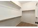 Walk-in closet with shelving at 43142 N Outer Bank Dr, Anthem, AZ 85086