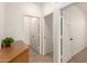Hallway with multiple doorways at 43142 N Outer Bank Dr, Anthem, AZ 85086