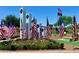 Veterans memorial surrounded by American flags, honoring service and sacrifice in a beautifully landscaped setting at 43142 N Outer Bank Dr, Anthem, AZ 85086