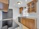 The kitchen features wood cabinets, granite countertops, and stainless steel appliances at 4554 E Paradise Village Pkwy # 161, Phoenix, AZ 85032