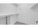 Organized walk-in closet offering ample storage with shelves and hanging rods at 4554 E Paradise Village Pkwy # 161, Phoenix, AZ 85032